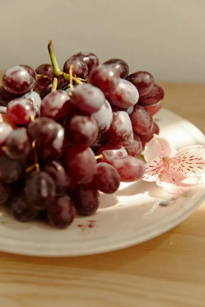 fresh grapes on a ceramic plate