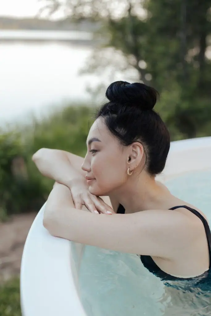 side view of a woman in a jacuzzi